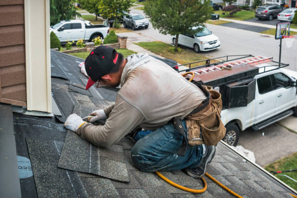 Professional Gutter Repair And Installation technician working in Palm City, FL